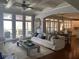 Inviting living room with coffered ceilings and an open layout to the dining and kitchen at 970 Tarpley Nw Rd, Kennesaw, GA 30152