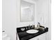 Elegant bathroom featuring a marble vanity with white cabinets at 1150 Rankin St # 19O, Stone Mountain, GA 30083
