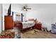 Comfortable bedroom with natural light, hardwood floors and a ceiling fan at 1150 Rankin St # 19O, Stone Mountain, GA 30083