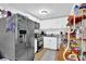 Well-lit kitchen featuring stainless steel appliances, white cabinetry, and granite countertops at 1150 Rankin St # 19O, Stone Mountain, GA 30083