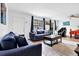Bright living room featuring stylish sofas, a ceiling fan, and ample natural light creating a comfortable atmosphere at 1150 Rankin St # 19O, Stone Mountain, GA 30083