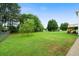 This beautiful home features a huge backyard with mature trees at 137 Cambridge Pointe, Villa Rica, GA 30180