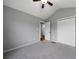 Neutral bedroom with a large closet and access to the en-suite bathroom at 137 Cambridge Pointe, Villa Rica, GA 30180