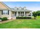 Inviting home exterior with dormer windows and a welcoming front porch at 137 Cambridge Pointe, Villa Rica, GA 30180