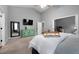 Large primary bedroom with ensuite bath and an attached sitting room with a desk at 137 Cambridge Pointe, Villa Rica, GA 30180
