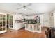 Bright kitchen with white cabinetry, a spacious center island, and a double doors to the backyard at 2549 Emerald Dr, Jonesboro, GA 30236