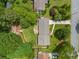 Aerial view of the home showcasing the landscaping, driveway, and backyard patio at 3019 Haverford Se Ln, Marietta, GA 30067