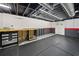 Basement with open ceiling and workbench and a black floor at 3019 Haverford Se Ln, Marietta, GA 30067