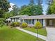 Charming single-story home with well-manicured front yard and mature trees at 3019 Haverford Se Ln, Marietta, GA 30067