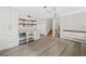Bright and airy living space featuring wood look floors, modern lighting and a neutral color palette at 3019 Haverford Se Ln, Marietta, GA 30067