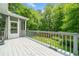 Outdoor deck with green backyard and tree views. Plenty of space to relax at 49 Timberlake Ne Cv, Cartersville, GA 30121