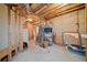 Unfinished basement area with exposed beams and storage space at 49 Timberlake Ne Cv, Cartersville, GA 30121