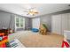 Spacious bedroom includes double closets, a ceiling fan, and plenty of room for play or relaxation at 49 Timberlake Ne Cv, Cartersville, GA 30121