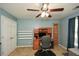 Cozy bedroom with a ceiling fan, a well-lit desk area, and neutral carpeting for a comfortable feel at 49 Timberlake Ne Cv, Cartersville, GA 30121