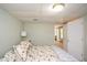 Bedroom featuring neutral décor with furniture and closet at 49 Timberlake Ne Cv, Cartersville, GA 30121