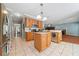 Kitchen with stainless steel appliances, wood cabinetry and center island, plus an eat-in space at 49 Timberlake Ne Cv, Cartersville, GA 30121
