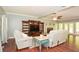 Cozy living room with hardwood floors, neutral paint, a decorative fireplace and comfortable seating at 49 Timberlake Ne Cv, Cartersville, GA 30121