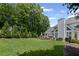 Spacious backyard featuring a well-maintained lawn and a inviting patio at 530 Veranda Ct, Alpharetta, GA 30009