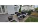Backyard patio features a stone surface, comfortable outdoor seating, and a grilling area at 530 Veranda Ct, Alpharetta, GA 30009