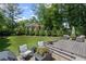 Serene backyard with lush lawn, patio, and a comfortable seating area at 530 Veranda Ct, Alpharetta, GA 30009