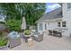 Outdoor patio space with wicker furniture, perfect for entertaining guests at 530 Veranda Ct, Alpharetta, GA 30009