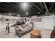 Finished basement area with furniture, overhead utilities, and neutral color palette at 530 Veranda Ct, Alpharetta, GA 30009