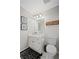 Stylish half bath featuring a modern vanity and decorative accents at 530 Veranda Ct, Alpharetta, GA 30009