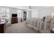 Bright and inviting bedroom featuring a bed, ceiling fan, window, and generous closet space at 530 Veranda Ct, Alpharetta, GA 30009