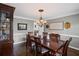 Elegant dining room with hardwood floors, chandelier, and stylish decor, perfect for entertaining at 530 Veranda Ct, Alpharetta, GA 30009