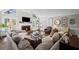 Inviting living room boasts a fireplace, plush seating, and abundant natural light, perfect for relaxation at 530 Veranda Ct, Alpharetta, GA 30009