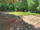 Spacious backyard with a patio and lush green landscaping at 575 Freeman Dr, Covington, GA 30016