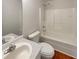 Bathroom featuring a tub and shower, vanity, and toilet at 575 Freeman Dr, Covington, GA 30016
