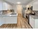 Modern kitchen featuring stainless steel appliances, and backsplash at 575 Freeman Dr, Covington, GA 30016