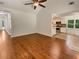 Bright living space featuring hardwood floors and a seamless flow to the modern kitchen at 575 Freeman Dr, Covington, GA 30016
