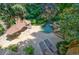Aerial view of the patio with small in-ground pool, hot tub, and lounge chairs at 1255 Beech Haven Ne Rd, Atlanta, GA 30324