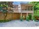 Spacious backyard featuring a covered patio and well-manicured landscaping at 1255 Beech Haven Ne Rd, Atlanta, GA 30324