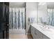 Bathroom features a shower and tub combo with modern vanity at 1255 Beech Haven Ne Rd, Atlanta, GA 30324