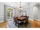 Beautiful dining room with coffered ceilings and a large window at 1255 Beech Haven Ne Rd, Atlanta, GA 30324