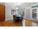 Open dining area features a round table and access to the outside through French doors at 1255 Beech Haven Ne Rd, Atlanta, GA 30324