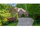 Charming brick home featuring a well-manicured lawn and inviting driveway at 1255 Beech Haven Ne Rd, Atlanta, GA 30324