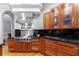 Close-up of kitchen with stainless steel appliances, custom cabinets and black countertops at 1255 Beech Haven Ne Rd, Atlanta, GA 30324