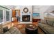Inviting living room features a fireplace, a wet bar, and comfortable seating at 1255 Beech Haven Ne Rd, Atlanta, GA 30324