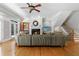 Living room showcases fireplace, wet bar, french doors, and stairway to second floor at 1255 Beech Haven Ne Rd, Atlanta, GA 30324