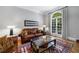 Comfortable living room features a large window and stylish decor at 1255 Beech Haven Ne Rd, Atlanta, GA 30324