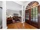 Cozy living room features hardwood floors and a large window overlooking the front yard at 1255 Beech Haven Ne Rd, Atlanta, GA 30324