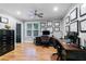 Office features hardwood floors, black filing cabinets and a desk at 1255 Beech Haven Ne Rd, Atlanta, GA 30324