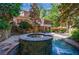 Gorgeous pool with waterfall feature and surrounding landscaping creates a serene outdoor oasis at 1255 Beech Haven Ne Rd, Atlanta, GA 30324