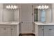 Bathroom with dual vanity sinks and a glass enclosed shower at 2505 Whistler Way Ne, Lawrenceville, GA 30043