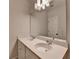 Bathroom features a double vanity with white countertop and a large mirror at 2505 Whistler Way Ne, Lawrenceville, GA 30043