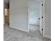 Bedroom with neutral walls and carpet and a view of a closet at 2505 Whistler Way Ne, Lawrenceville, GA 30043